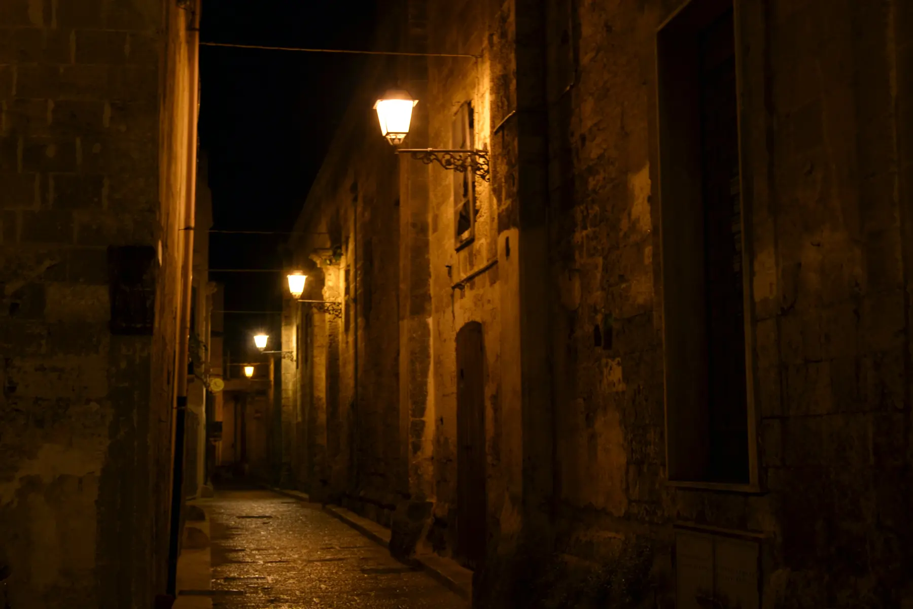 An illuminated street in the historic centre of Manduria